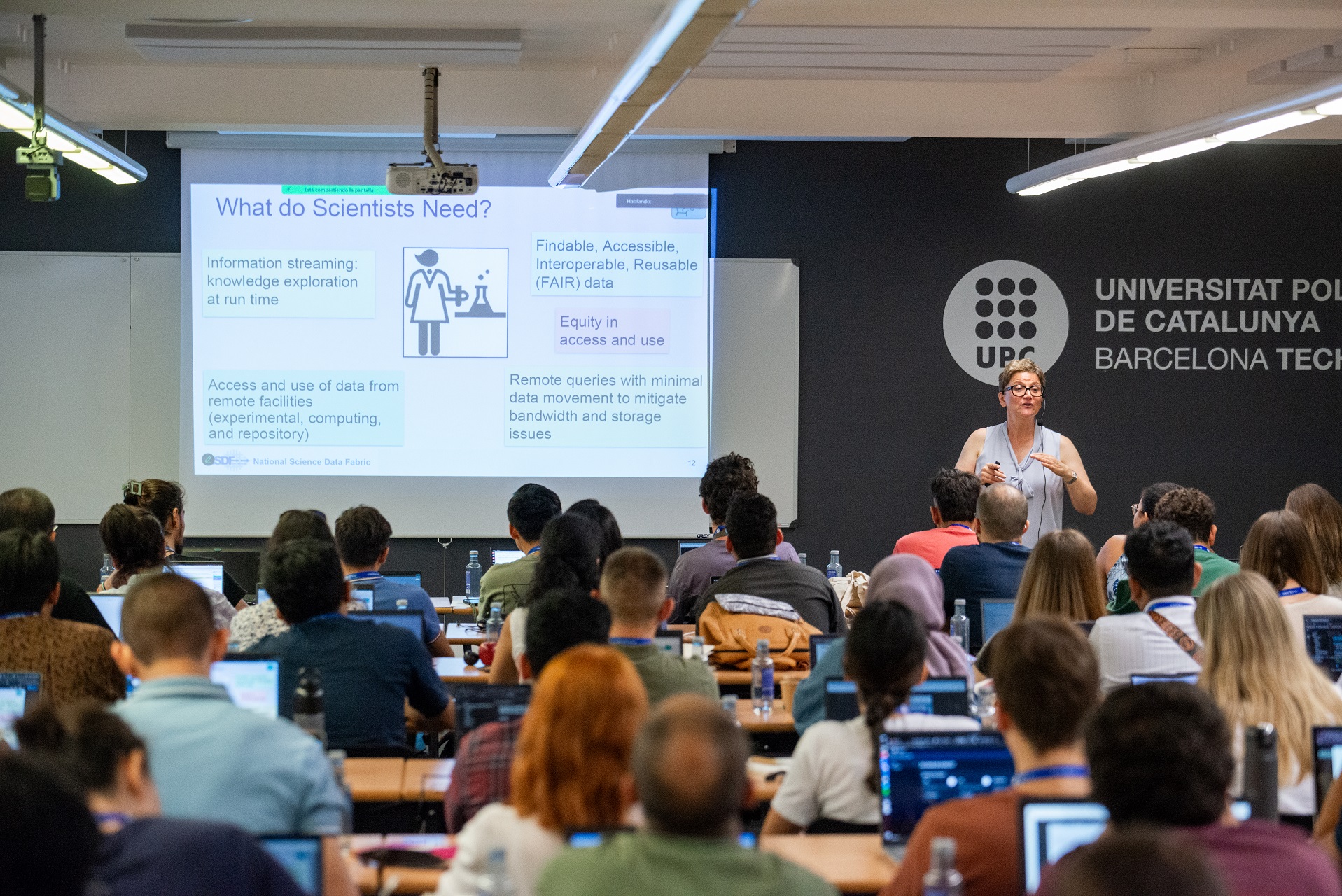 Photo of a lecture during the 2025 ACM Europe Summer School on HPC and AI